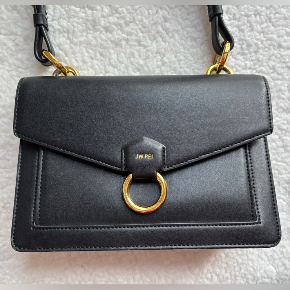 JW PEI Envelope Chain Crossbody bag in black vegan leather with gold hardware